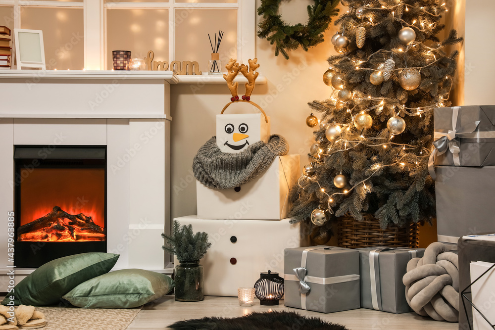 Funny snowman in living room decorated for Christmas