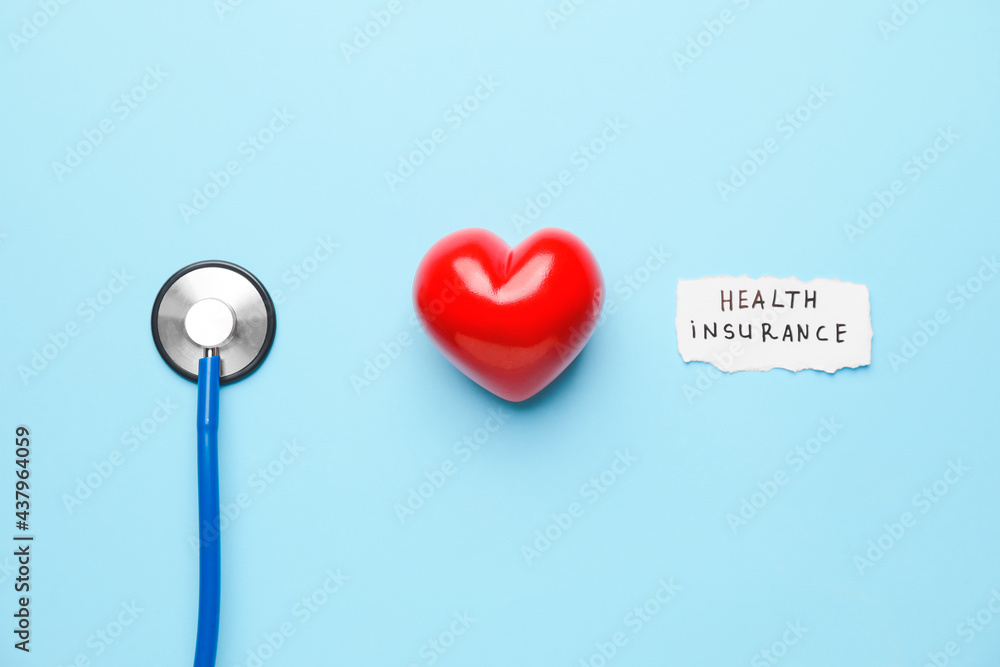 Stethoscope with heart and text HEALTH INSURANCE on color background