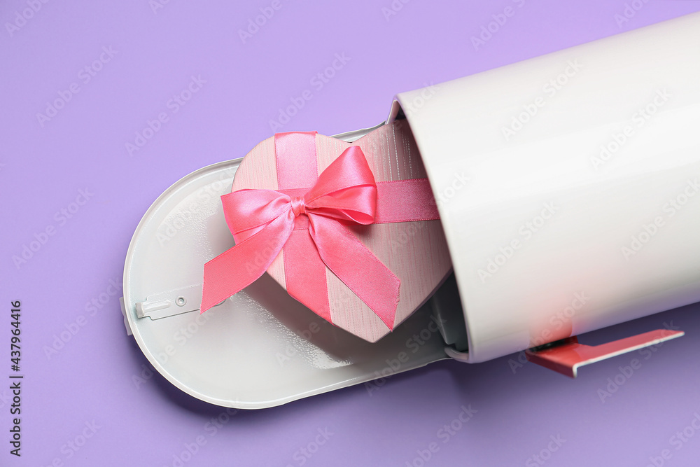 Mail box with gift on color background