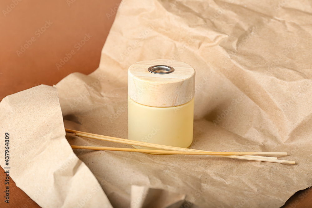 Modern reed diffuser on paper sheets