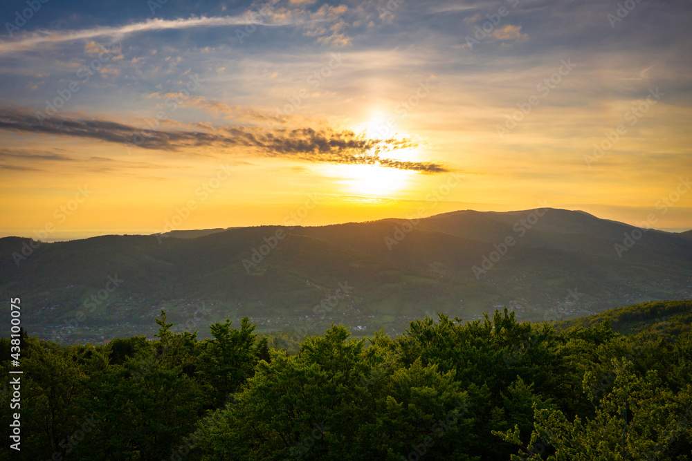 Panorama of the Silesian Beskids from Rownica peak at sunrise. Poland