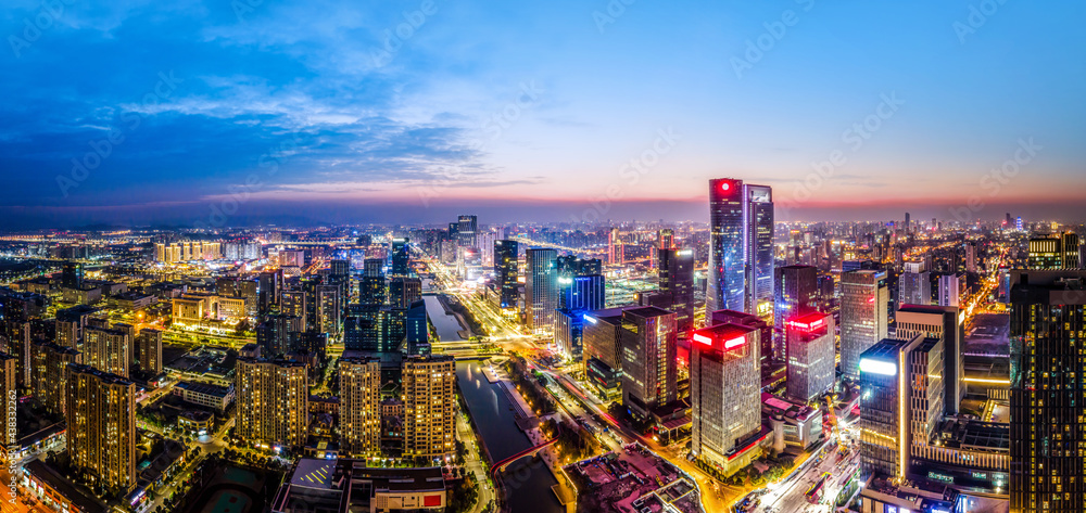 Aerial photography of the night view of the urban architecture skyline of Ningbo, Zhejiang