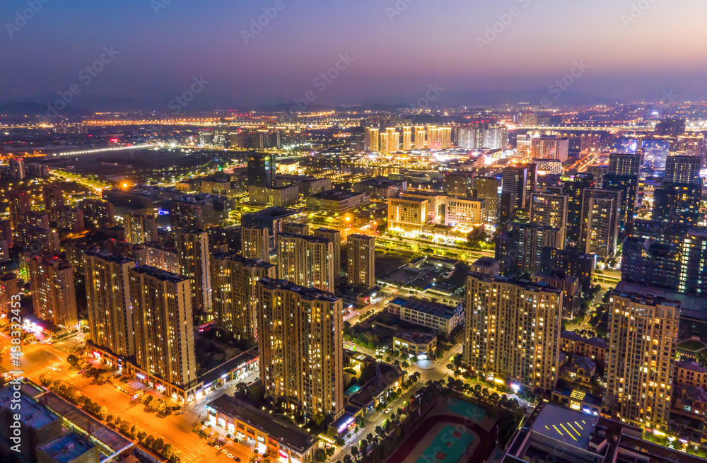 Aerial photography of the night view of the urban architecture skyline of Ningbo, Zhejiang