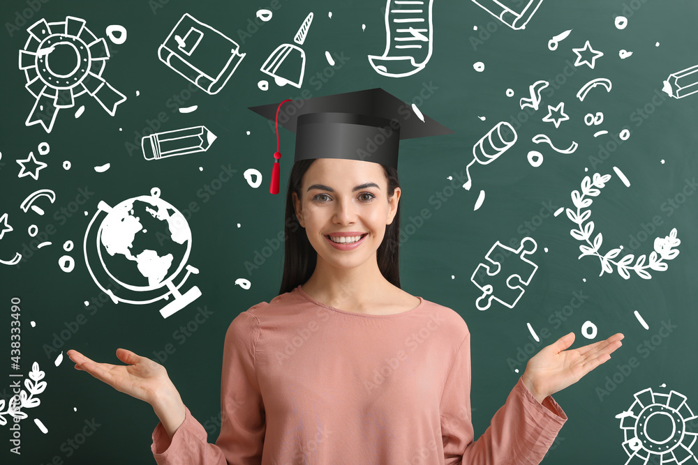 Female graduating student near blackboard