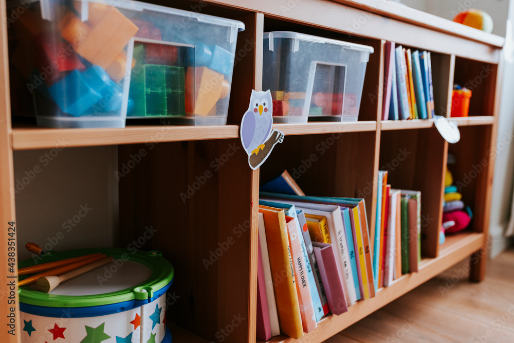 Shelves of toys and books in a nursery school