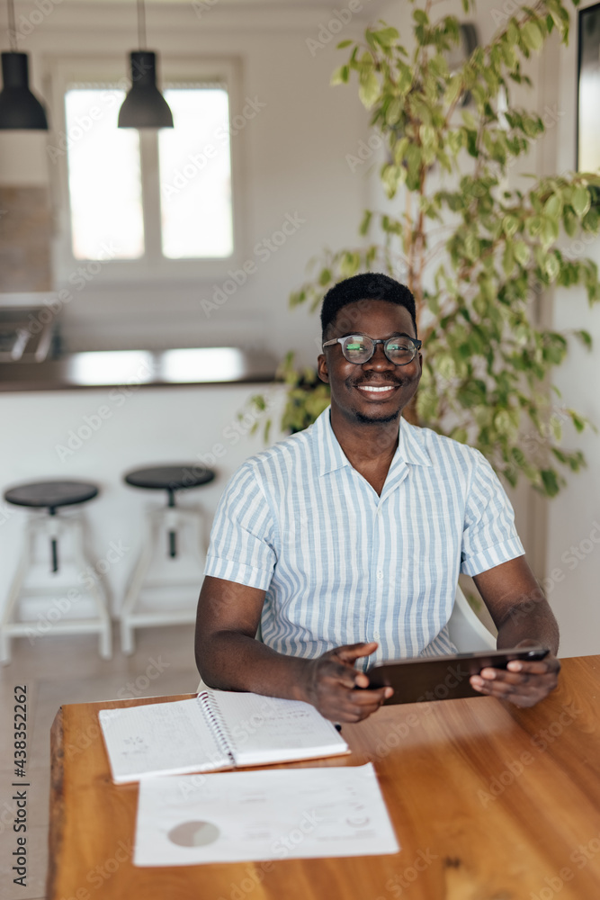 Adult black man, cleaning his message folder.