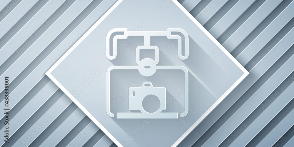 Paper cut Gimbal stabilizer with DSLR camera icon isolated on grey background. Paper art style. Vect