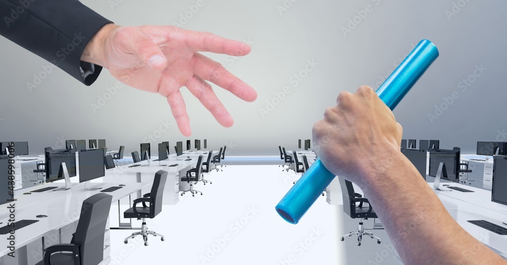 Composition of two people passing blue relay baton over empty office in background