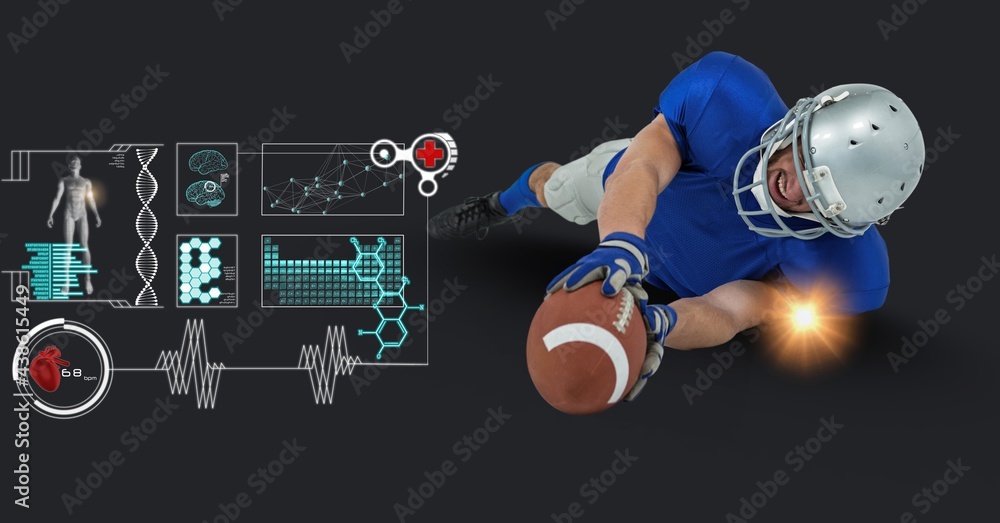 Digital interface with data processing against male rugby player wearing helmet catching rugby ball