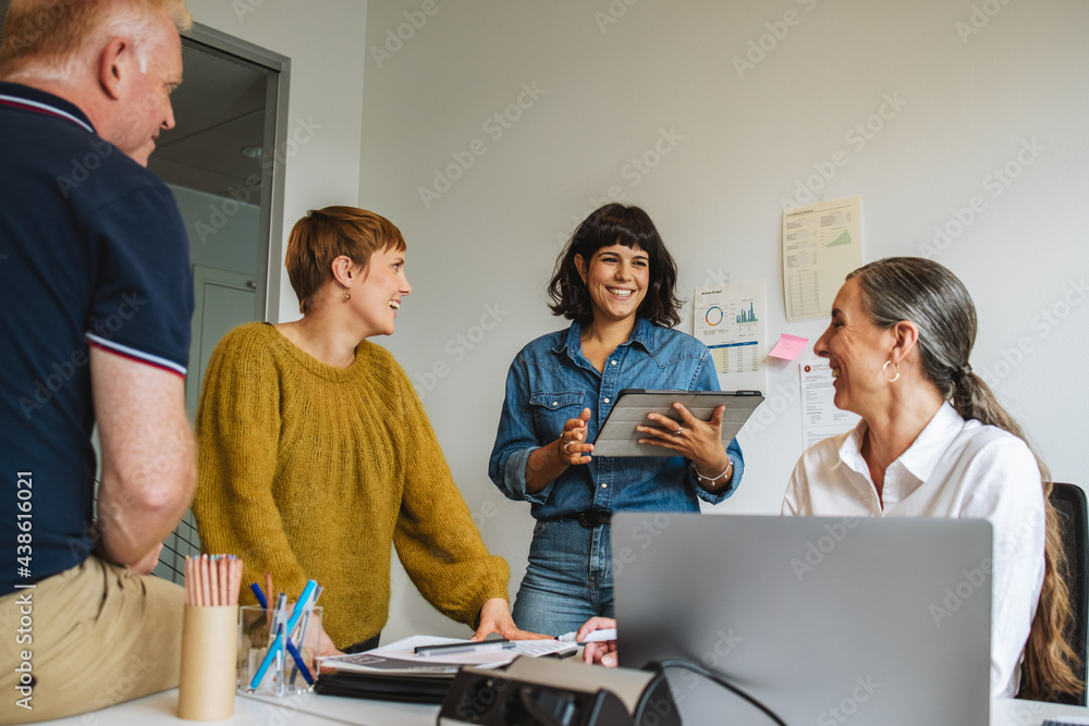 Entrepreneurs in office discussing new strategy