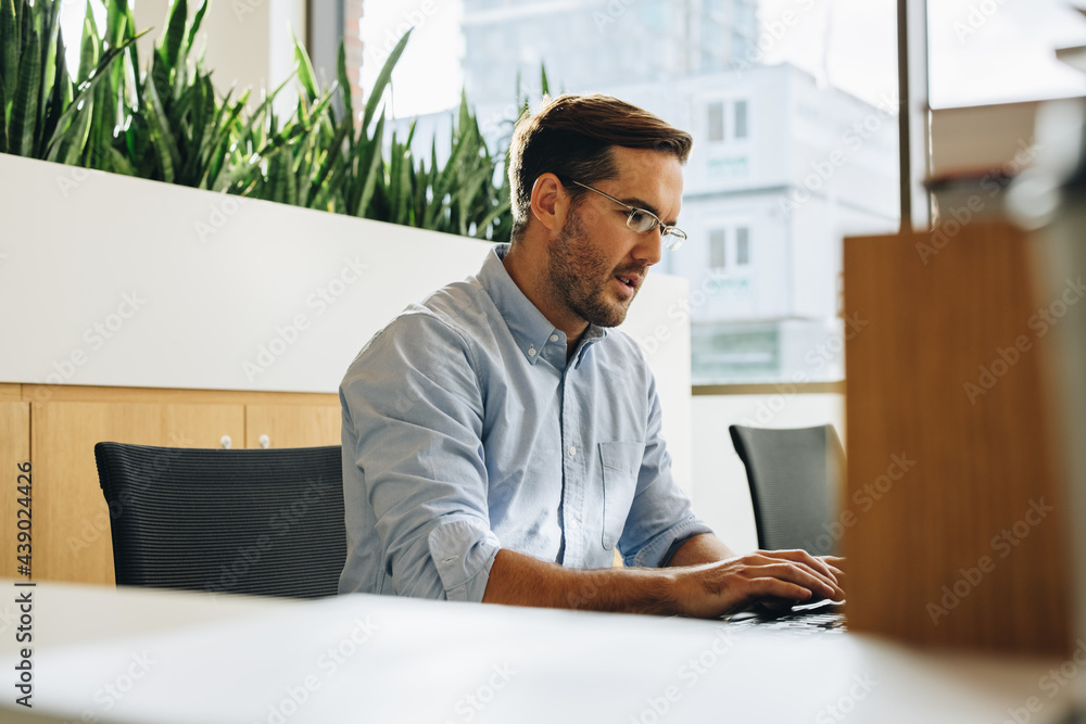 Freelancer doing work on computer