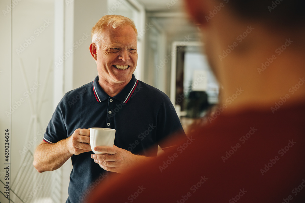 Business people having a coffee break at work