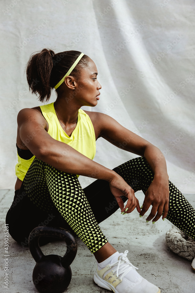 Female athlete relaxing after workout