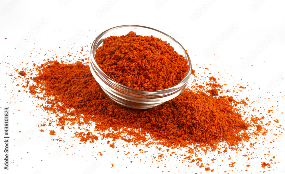 Pile of red paprika powder isolated on white background