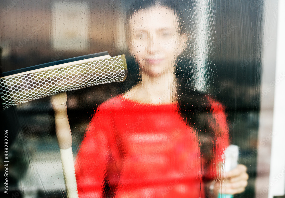 Caucasian woman doing house chores