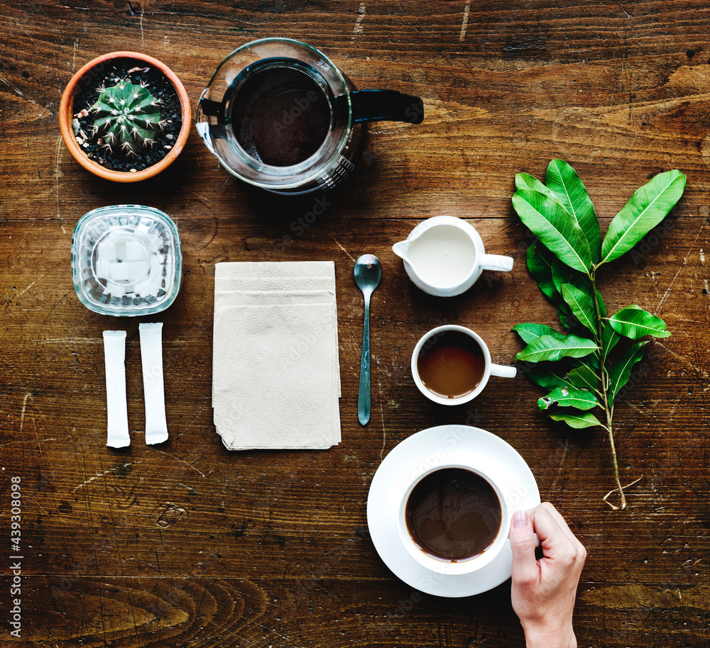 Aerial view of coffee setting on wooden table