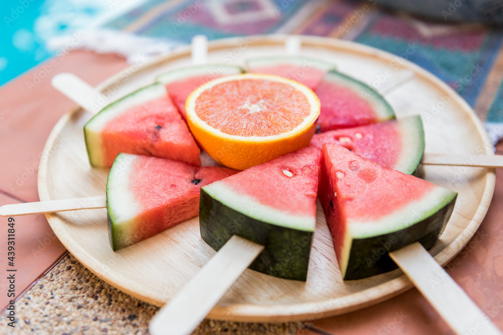 A dish of sliced watermelons