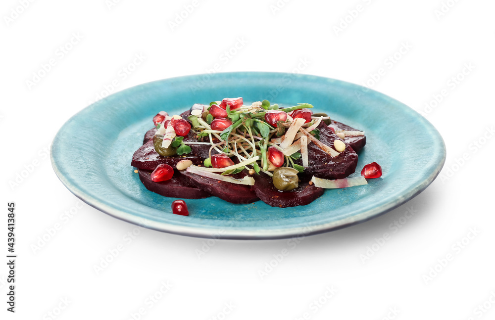 Plate with delicious beetroot carpaccio on white background