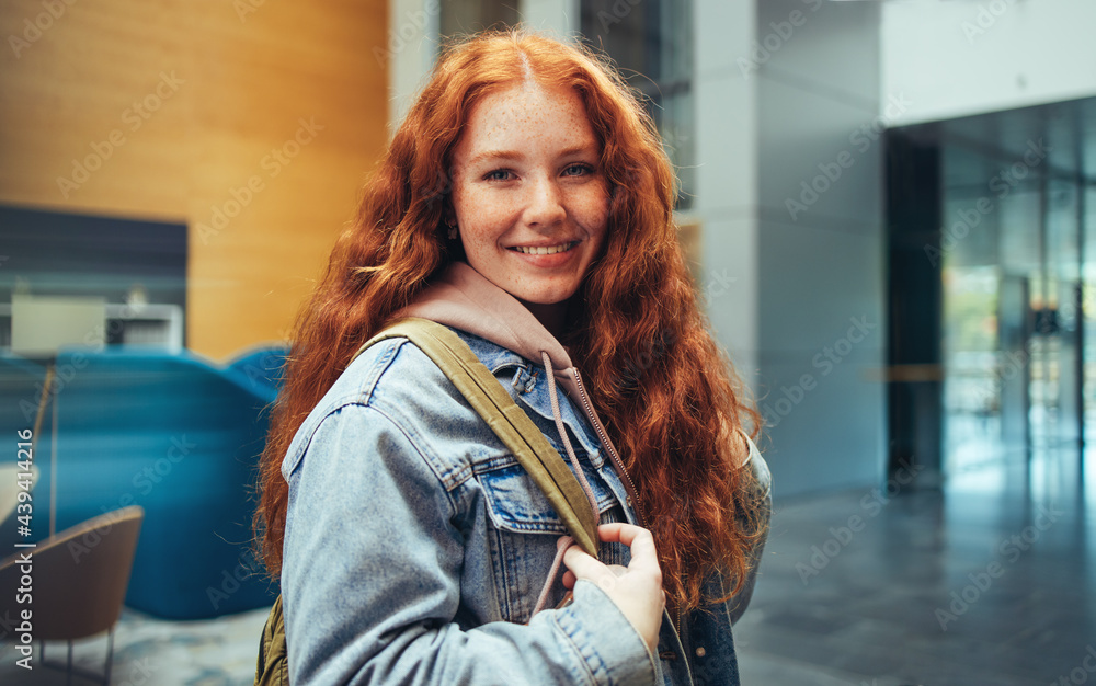 Young girl student going for class in high school