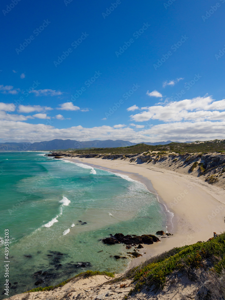 Wonderful elevated views of the Walker Bay Nature Reserve coastline with the Kleinrivier mountains i