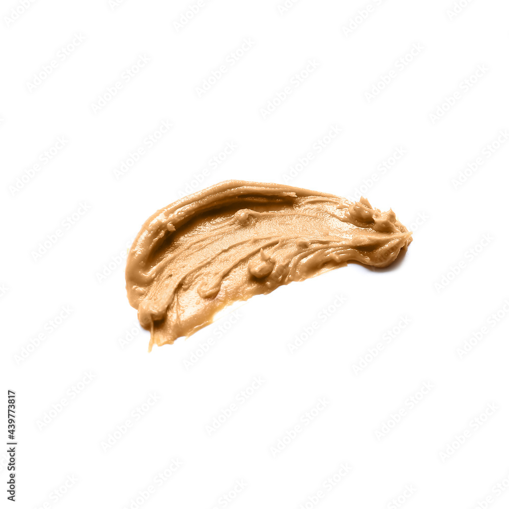 Tasty peanut butter on white background