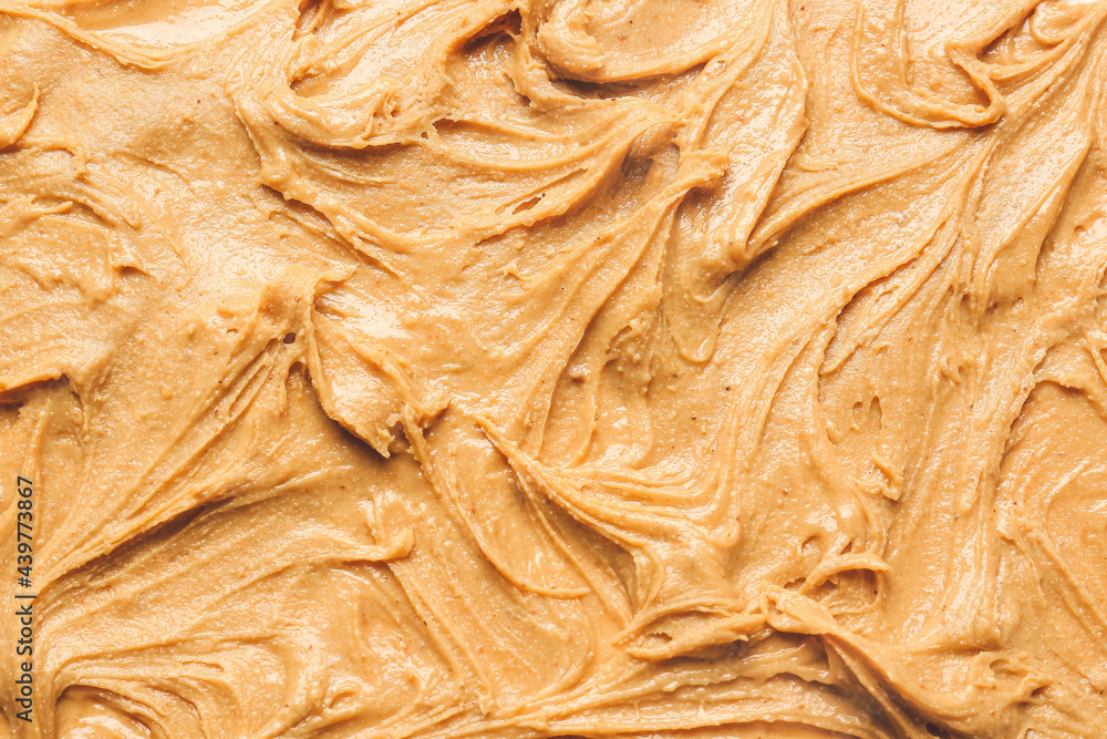 Heap of tasty peanut butter, top view