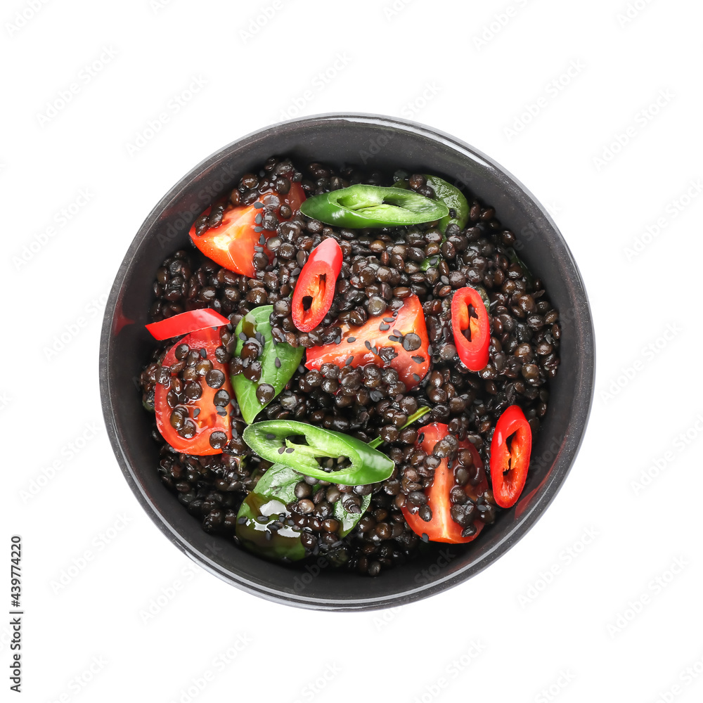 Bowl with tasty cooked lentils and vegetables on white background