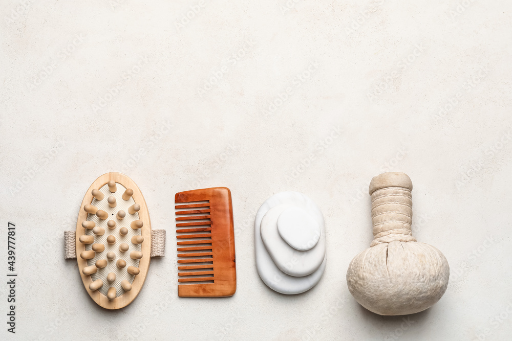 Set of spa supplies on grey background