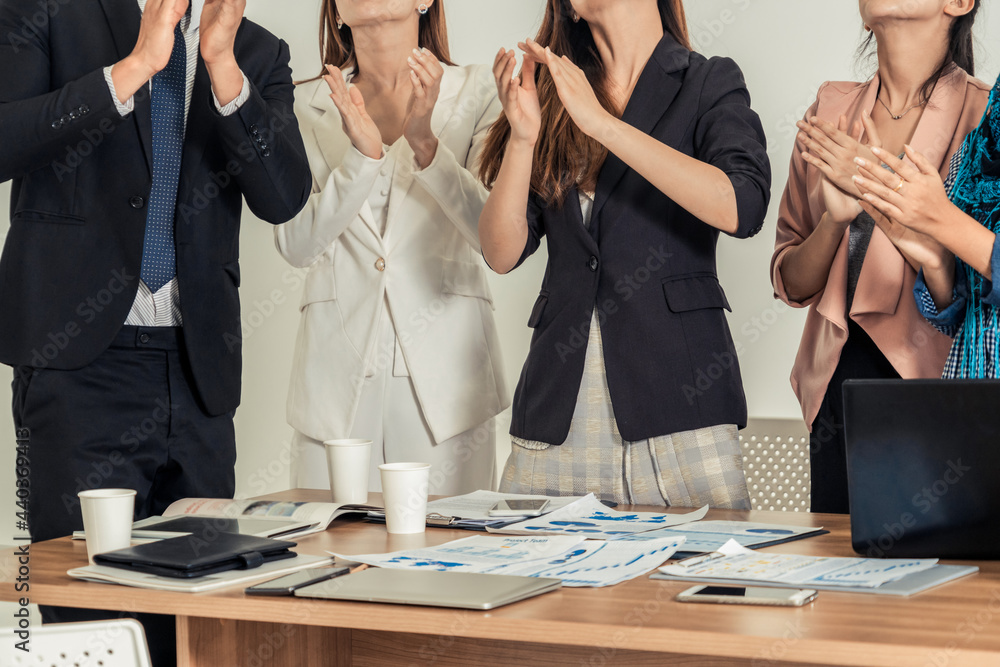 Business people applauding in a business meeting. Conference and presentation award concept.