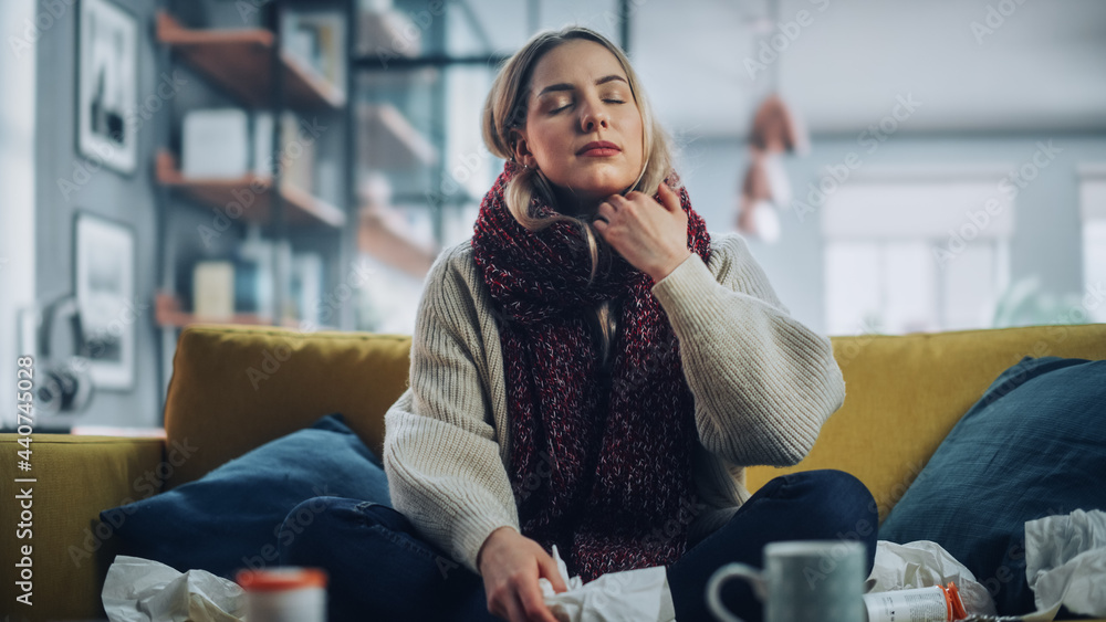 Portrait Shot of an Ill Young Female Calling into Office with Video Phone Call from Cozy Living Room