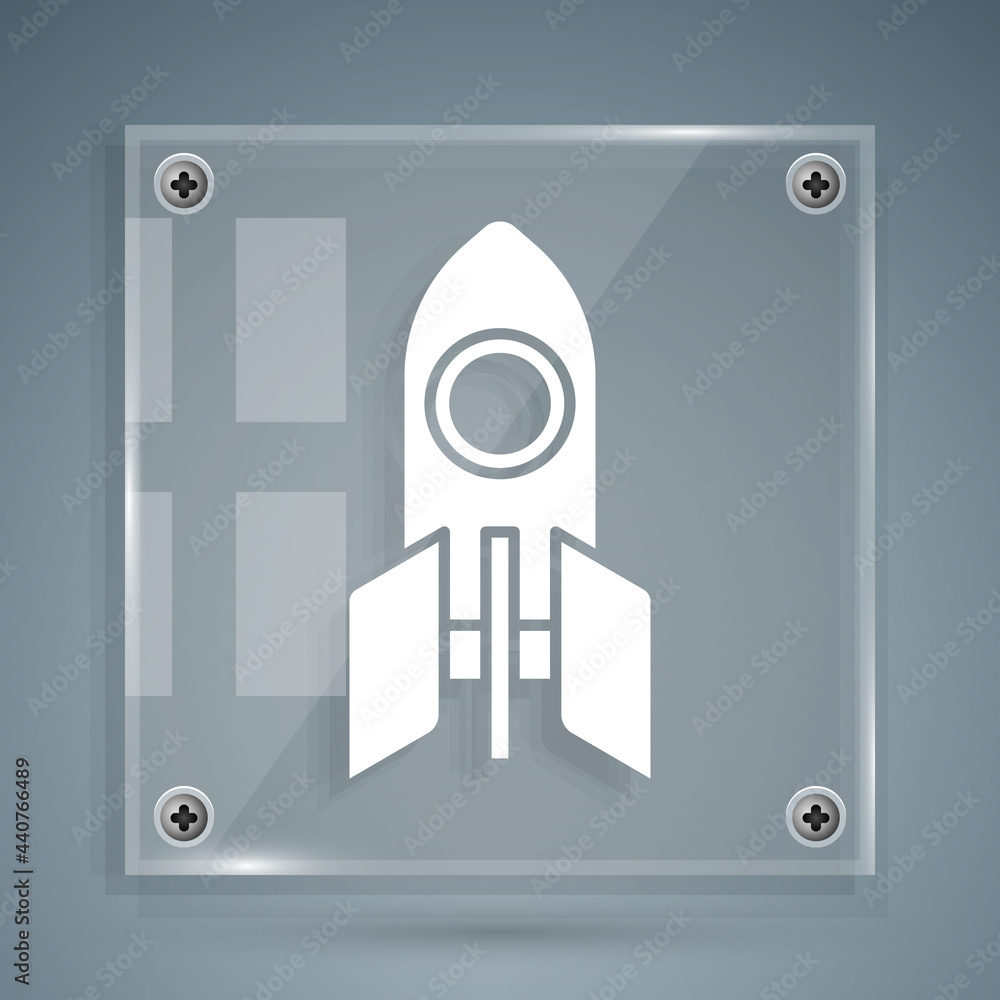 White Rocket ship icon isolated on grey background. Space travel. Square glass panels. Vector