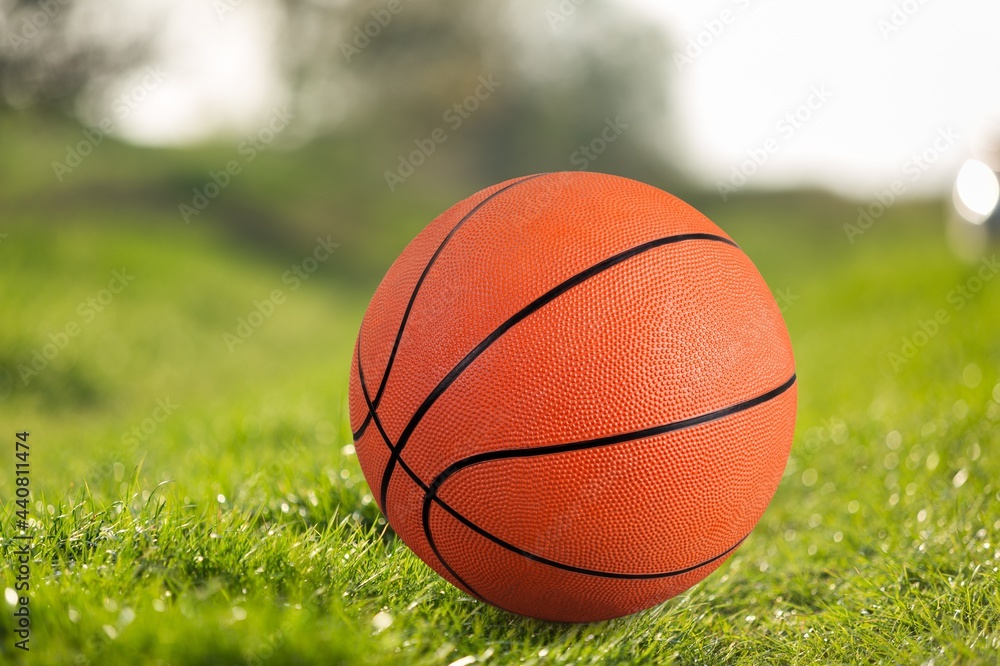 New orange basketball ball on the floor