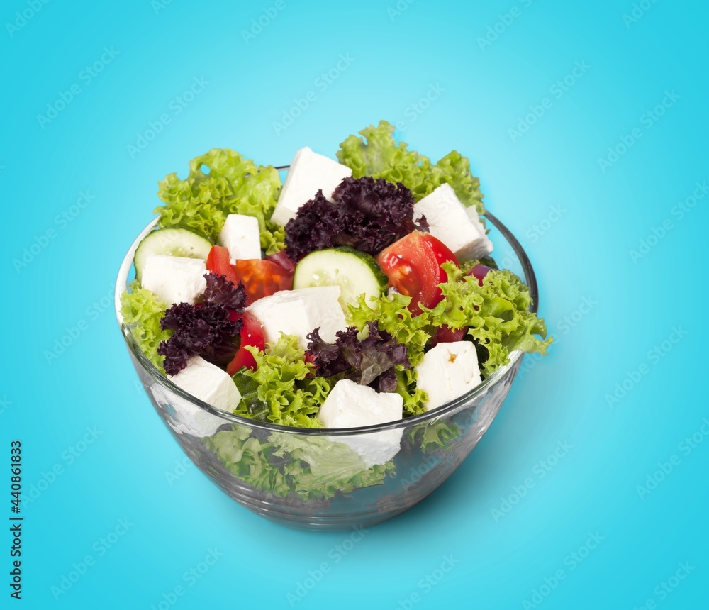 Classic tasty salad with fresh vegetables, cheese. Healthy food.