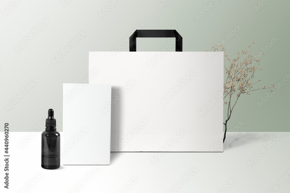 Cosmetic dropper bottle with card and bag