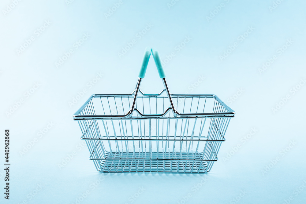 A shopping basket on a blue background