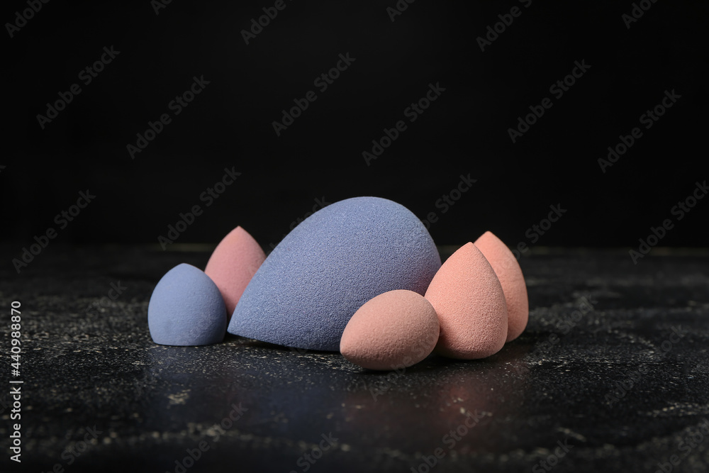 Makeup sponges on dark background