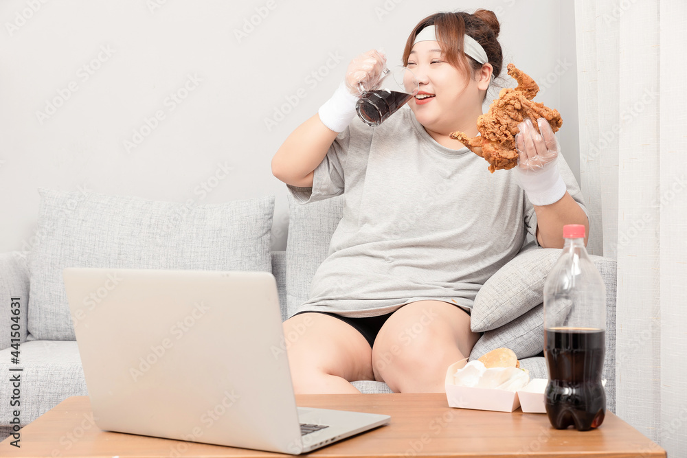 Asian fat girl sitting on the sofa