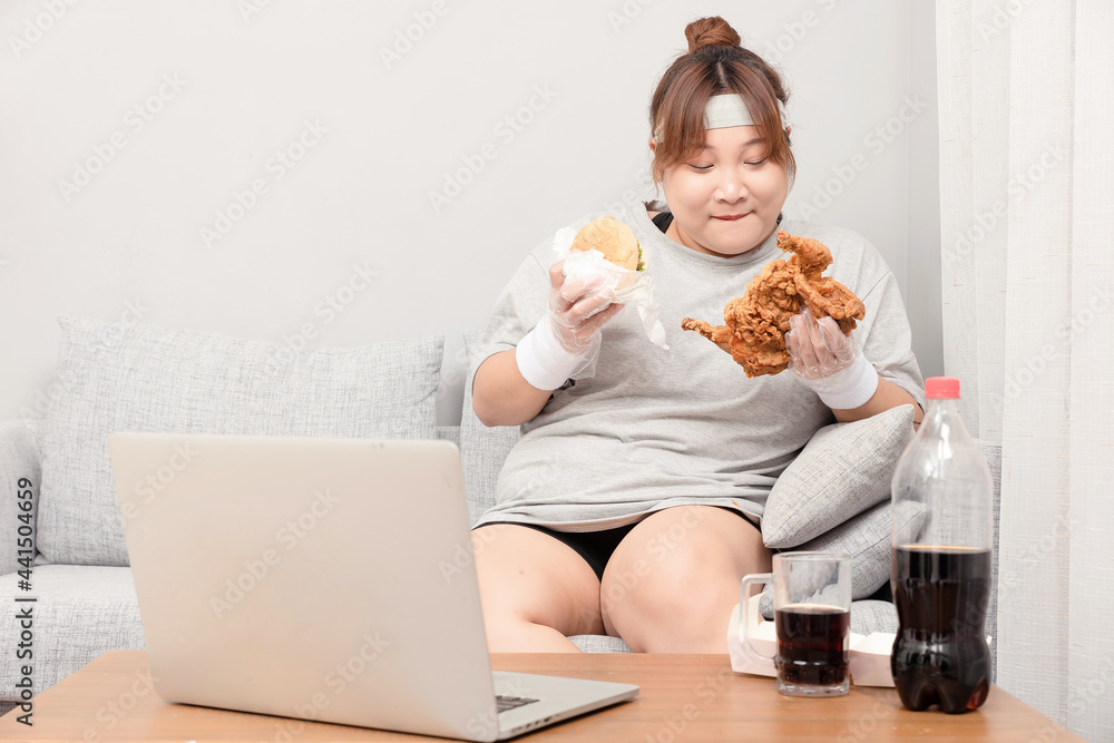 Asian fat girl sitting on the sofa