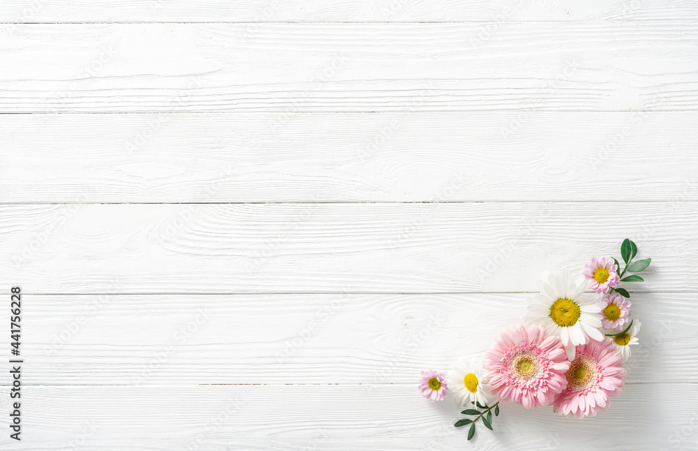 Flowers composition. White flowers on white wooden background. Wedding mockup with pink and white fl