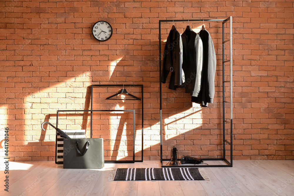 Interior of stylish hallway with rug