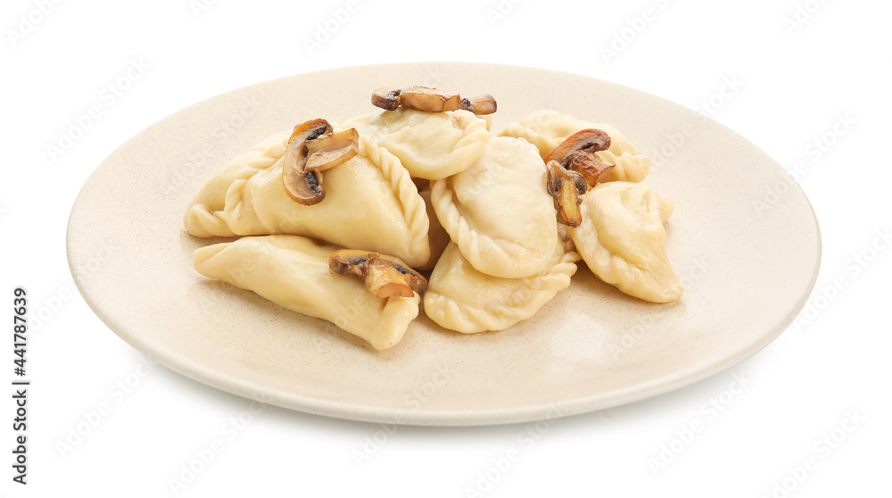 Plate with tasty dumplings on white background