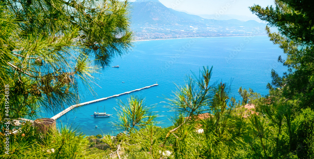 Beautiful view from side ancient fortress of city Alanya to turquoise water sea bay, coastal line ho