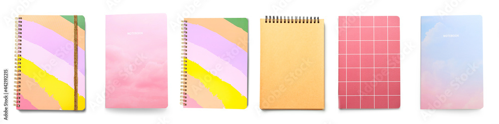 Stylish notebooks on white background