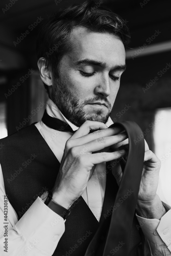 Handsome Groom Dressing Up for Wedding Ceremony