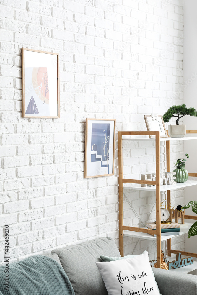 Interior of stylish living room with pictures