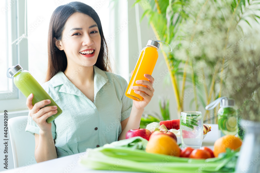 Beautiful Asian woman enjoying a plant-based meal