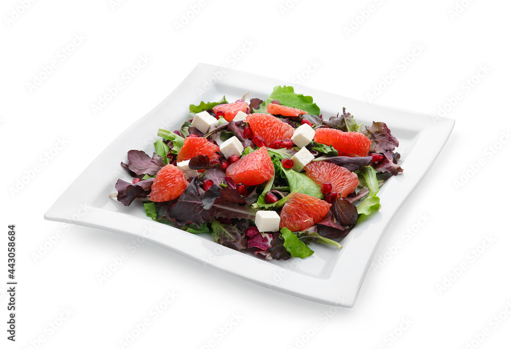 Plate with tasty grapefruit salad on white background