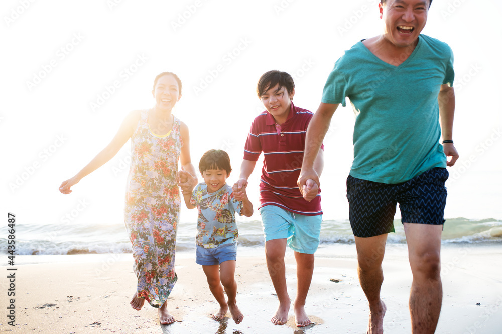 Asian family at the beach