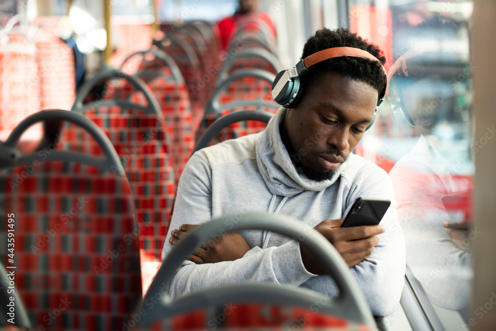 Man riding the bus alone