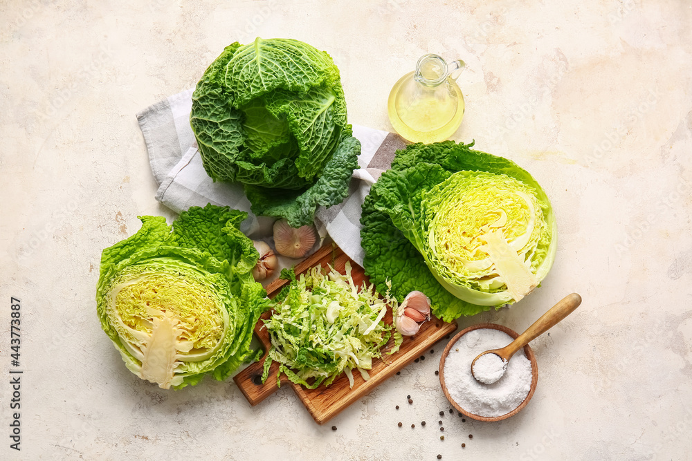 Fresh savoy cabbage on light background